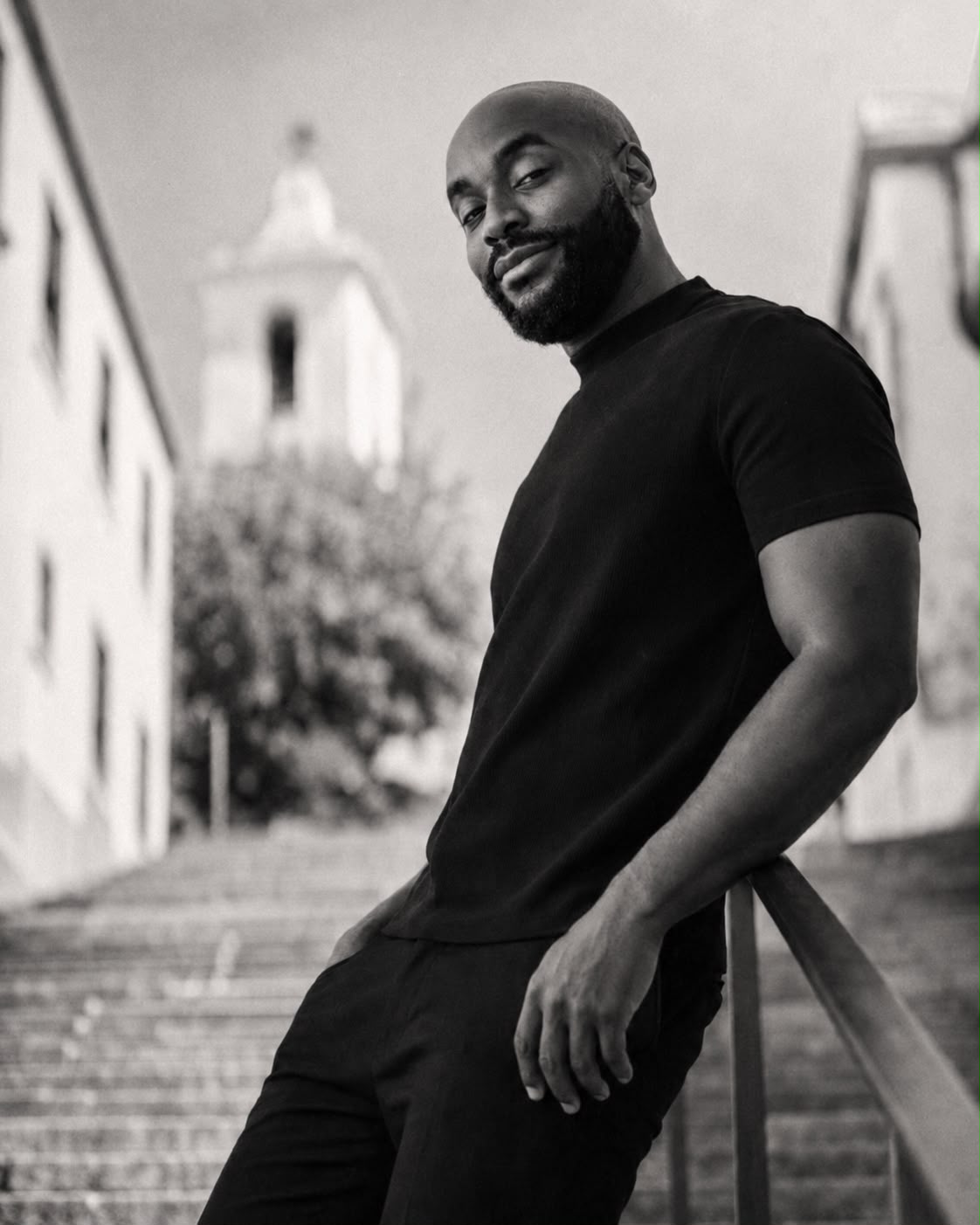 Dwinnah standing outdoors in a black T-shirt